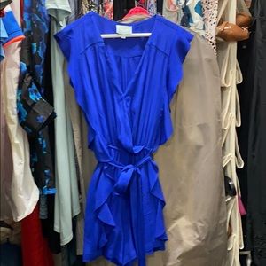 Blue ruffle romper with pockets